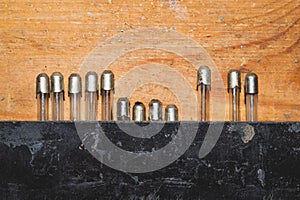 Fuse on wood background. safety device for overcurrent protection. protection of an electrical circuit