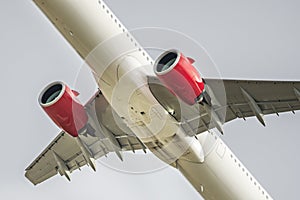 Fuselage of an airline passenger plane taking flight towards