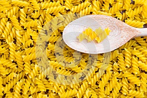 Fusilli macaroni and a spoon