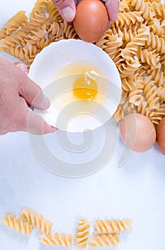 Fusilli pasta made by hand in the kitchen with natural ingredients