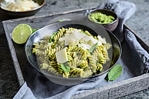 Fusilli pasta with pea pesto made from sage and pumpkin seeds