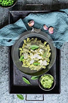 Fusilli pasta with pea pesto made from sage and pumpkin seeds