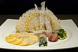 Fusion cuisine dish in a white dish