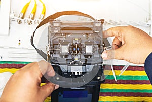 Fusion of Fiber Optics Cable Internet signal splicing and wire connection using equipment, optical line welding machine Optic