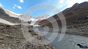 Fusion mountain river generated from the Palla Bianca glacier in strong retreat