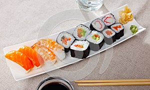 Futomaki, hosomaki and nigiris - japanese rolls closeup