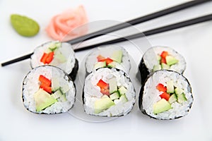 Futomaki, pepper and avocado. Traditional japanese sushi rolls