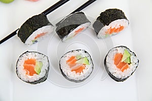 Futomaki, salmon and avocado. Traditional japanese sushi rolls