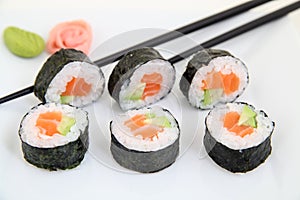 Futomaki, salmon and avocado. Traditional japanese sushi rolls