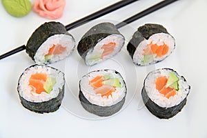 Futomaki, salmon and avocado. Traditional japanese sushi rolls