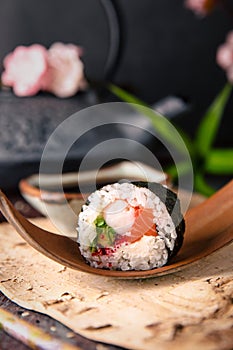 Futomaki with salmon, royal prawn, avocado, chuka, tobacca and cream cheese Philadelphia Sushi menu.