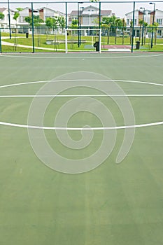 Futsal court concrete flooring and lines.