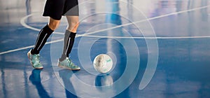 Futsal player control the ball for shoot to goal photo