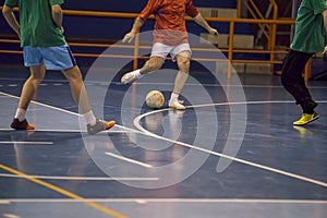Futsal player in the sports hall