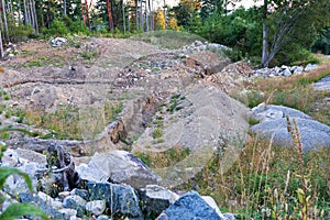 Future construction site of  a home property in the forest left derelict and neglected - zoned for residential use