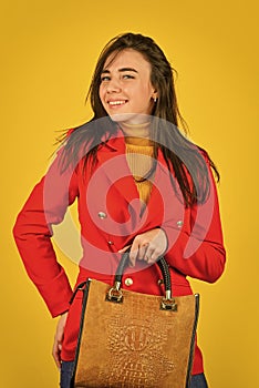 The future of fashion. Stylish female accessories. beautiful woman holding bag. Autumn trendy outfit woman. leather