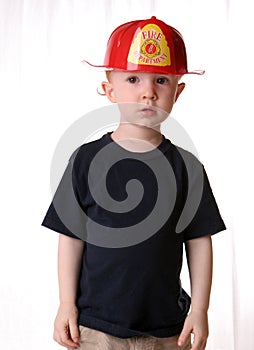 Future fireman redhead kid