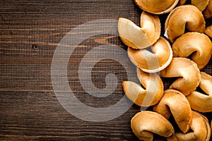 Future prognostic with fortune cookie on wooden background top view mock-up