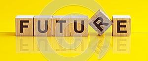 Future word on block concept. future growth concept. The image is mirrored in the glossy surface. For your design, the concept is