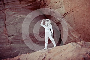 Futuristic astronaut on another planet, image with