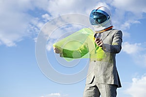 Futuristic Astronaut Businessman Using Flexible Display Tablet