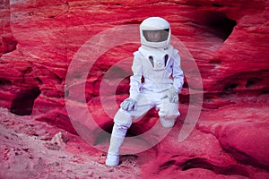 Futuristic astronaut on crazy pink planet, image