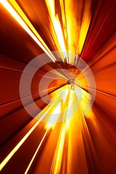 Futuristic background of speed motion blurred underground subway