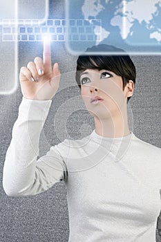 Futuristic businesswoman finger keyboard screen