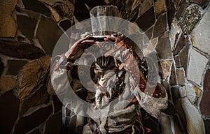 Futuristic character cyborg stalker. Art Photography in steampunk style.