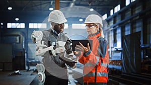 Futuristic Concept of a Manual Labor Worker in a Bionic Exoskeleton Prototype Working in a Factory