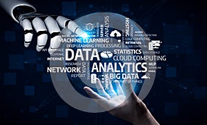 Futuristic Concepts of Data Analytics and Cloud Computing with Robotic Hand Interacting with Digital Elements on Dark
