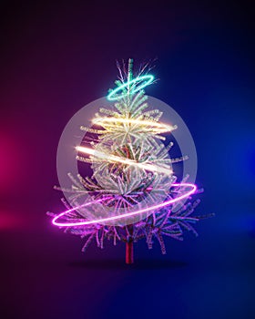 Futuristic creative cyberpunk concept of Christmas tree with neon hoops on urban dark background. New year party