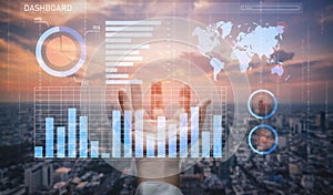 Futuristic Data Visualization on a Hand with City Background at Sunset Impute
