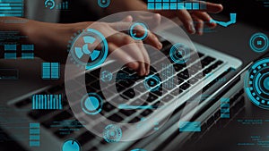 Futuristic Digital Interface with Hands Typing on Laptop Surrounded by Data Visualization Elements and Graphical