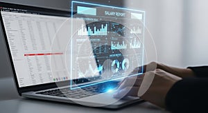 Futuristic digital interface projected from laptop screen with user interacting digitally