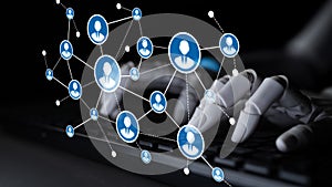 Futuristic Digital Network Connecting Users Through Technology with Robotic Hands Typing on Keyboard in Dark Environment