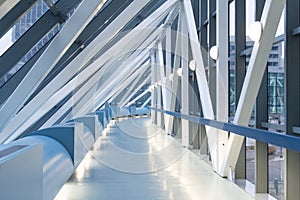 Futuristic Elevated Walkway Glows Softly In Blue L photo