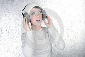 Futuristic fashion woman hearing music headphones