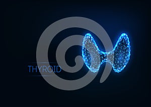 Futuristic glowing low polygonal human thyroid gland isolated on dark blue background.