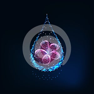 Futuristic glowing low polygonal water drop with abstract purple flower on dark blue background.