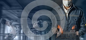 Futuristic industry technology concept, engineer using high technology including 5g, artificial intellingence, robot, augmented mi