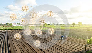 Futuristic innovative technology pictogram and a farmer on a tractor. Development of technology improvements. Agricultural photo