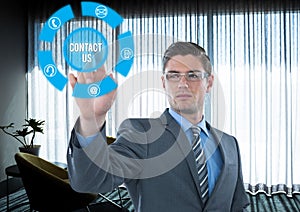 Futuristic interface in a office with the sign contact us