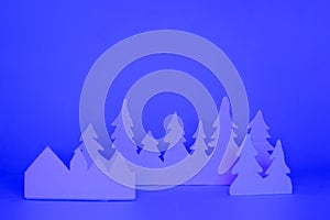 Futuristic modern abstract happy New Year 2022, Merry Chrstmas concept. Pine tree from paper on neon bright violet blue background