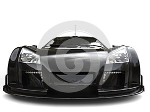 Futuristic pitch black supercar - front view extreme closeup shot