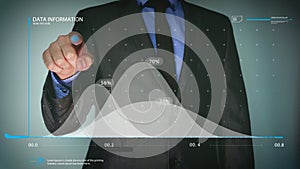 Futuristic portrait of a businessman uses a career chart, a hologram, a diagram, in a suit, makes a finger click. Concept: future,