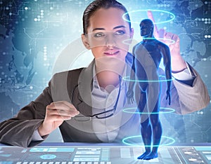 Futuristic remote diagnostics concept with businesswoman