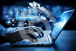 Futuristic Robot Hand Interacting with Laptop Displaying Cloud Computing Technology and Digital Data Visualization in a