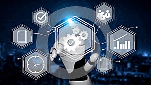 Futuristic robotic hand interacting with digital interface showcasing technology, automation, data analysis, and