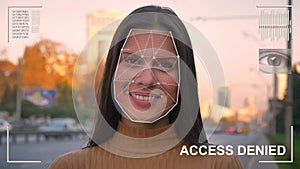 Futuristic and technological scanning of the face of a beautiful woman for facial recognition and scanned person